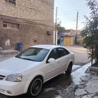 اوبتر 2011 رقم واسط الجديد بسمي بيها جاملغ مصبوغ وشويه من الباب الصدر ...