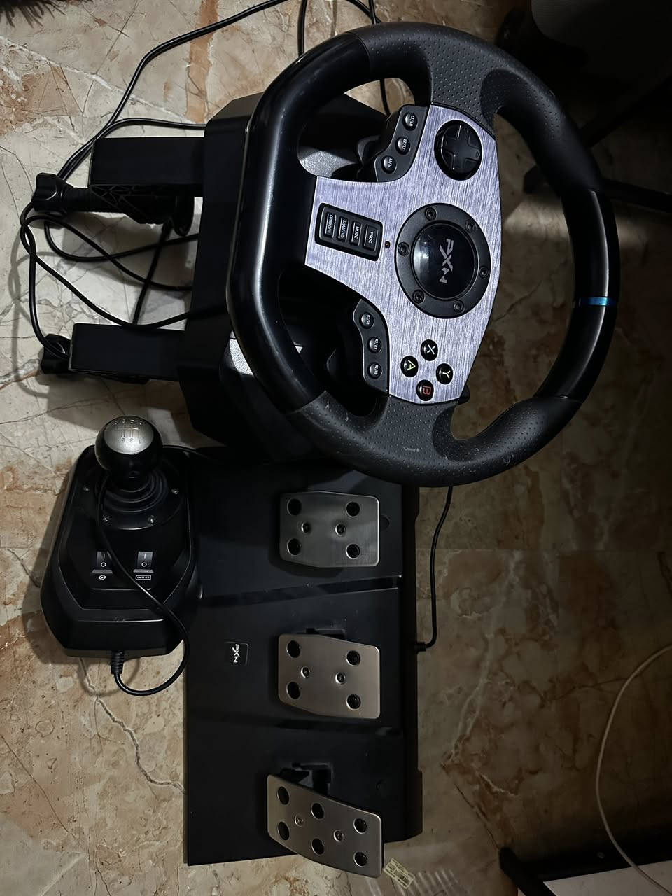 دركسون PXN V9 لببيع
استعمال قليل نظافة 100% 
فره ونص يرهم بلايستيشن 3و4 واكس بوكس سيريس اس وX والبي سي
كامل ملحقات الگير والدواسات والكارتون
السعر 90 الف وبيه مجال بسيط
مكاني الناصرية
***********
