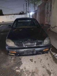 دايو لكنزا للبيع موديل ٩٧ سياره جارده كما موضح بل صور رقم ديالى انكليز...