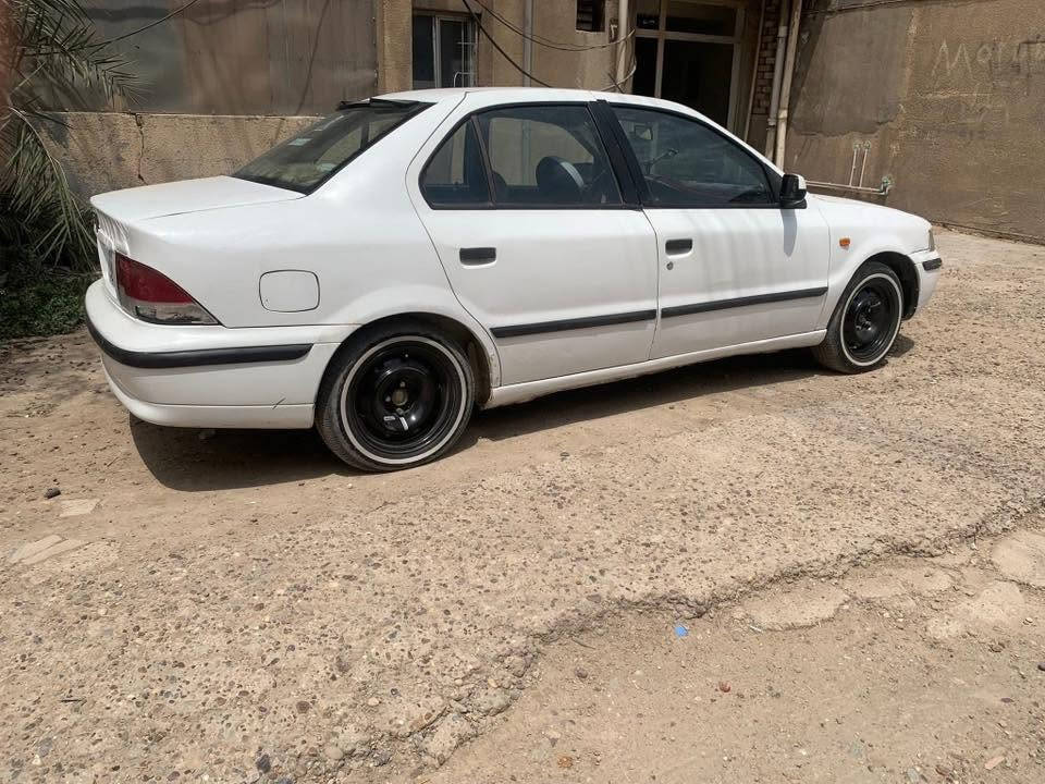 سمند مديل 2011 رقم بغداد انكليزي السيارة بيها ضربة بل جاملغ موضحة كدامكم سعر مناسب الشراي يتصل ***********

