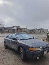 مازدا ٣٢٣ • ١٩٩٢ • رقم كركوك