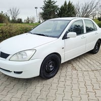 لانسر • ٢٠١١ • توماتيك