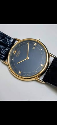 سيكو كالكسي • صنع ياباني ١٩٩٥ • ٣٢مم ذهبي