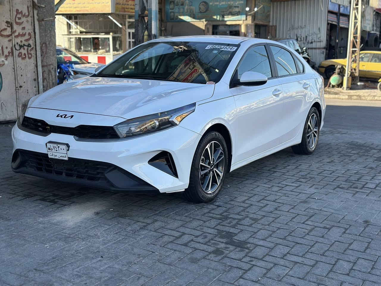 السلام عليكم 
للبيع فورتي 2023 دخول جديد (بدون رقم {فحص مؤقت} ) 
منفيست بأسمي 
*الموصفات 
 
محرك 2000 دوش 
‏‎كامره دوراه 📷
‏‎شاشه كبيره تدعم 
‏📲Android Auto/car play
‏‎خرائط Gps 📌
‏‎رادار امامي 🚷
‏‎سياقه ذاتيه /تحديد مسار 
‏‎اوتو بريك (توقف ذاتي عند الاقتراب ⚠️)
‏‎فول تحكمات ستيرن 
3 انظمة قياده 
‏Sport/Normal/Smart
‏‎كروز مثبت سرعه
‏‎ويل كب كروم 
‏‎حساس اطارات 
‏‎شاشة ظبط واعطال بل دشبول 
‏‎
3منافذ 
‏Usp/ Aux/ 12v
دسك/ مانع انزلاق/Abs
‏‎السياره جديده وجاهزه بدون نواقص👉👉👉
 حادثها (بارد بل بنيد وبل جنطه بيهه صبغ بس مكان الرقم الي بل جنطه بدون ايرباك بدون صبغ بدون فتح اي قطعه كلهه ليبل واحد   ) 👉👉👉
السيارة ماشيه ٢٧ الف 
اعيد واكرر بدون صبغ بدون فتح اي قطعه بدون ايرباك 👉
عنواني :بغداد حي العامل  
السعر 143 وبيهه مجال 
 
للاستفسار :***********
