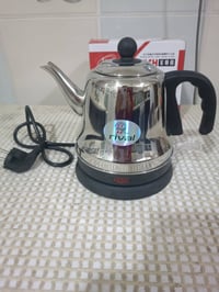 قوري ستيل كهربائي • هيتر صغير • جديد بالباكيت