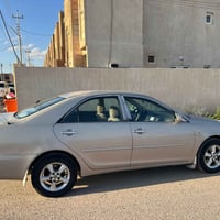 كامري ٢٠٠٤ • محرك ١٨٠٠ مكفول • رقم دولي نينوى