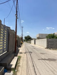 قطعة أرض للبيع مساحه 200متر واجهة 9,50والنزال 22 خدمات كامله ماء تبليط...
