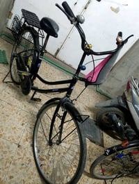 بايسكل أسود • حالة جيدة • سلة خلفية