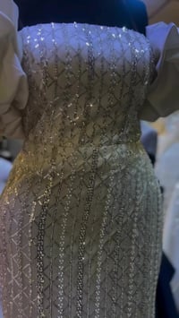 ملابس • ماكو وصف