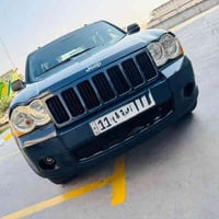 بيع او مراوس حسب القناعه  جيب شيروكي  الموديل:2009 رقم  بغداد دولي باس...