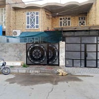 حي الإمام الرضا • ٢٠٠م • مطل على ساحة خضراء