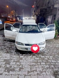 اخوان سياره بروتون حره لون ابيضّ صبغ فقط هلال الجامرلق الخلفي  شويه با...