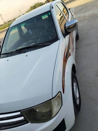 ميتسوبيشي • ٢٠١١ • محرك ٢٤٠٠