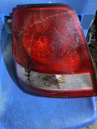 باك لايت سورنتو • 2004-2006 • صفحة السائق