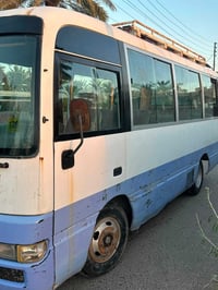 كوستر نيسان 2002 رقم بغداد اجره محرك بطه مكفول من كلشي السياره خير من ...