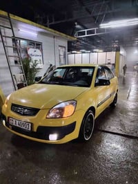 كيا ريو 2009 رقم بغداد باسمي سنويه جديده هيئة وغرامات صفر كوبون بنزين ...