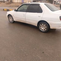 بيجو ٣٠٦ • رقم بغداد • محرك وكير شرط