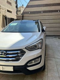 سنتافي موديل 2014 خليجي ماشي 197 الف صبغ ربع البنيد فقط فول 1/1 7 راكب...