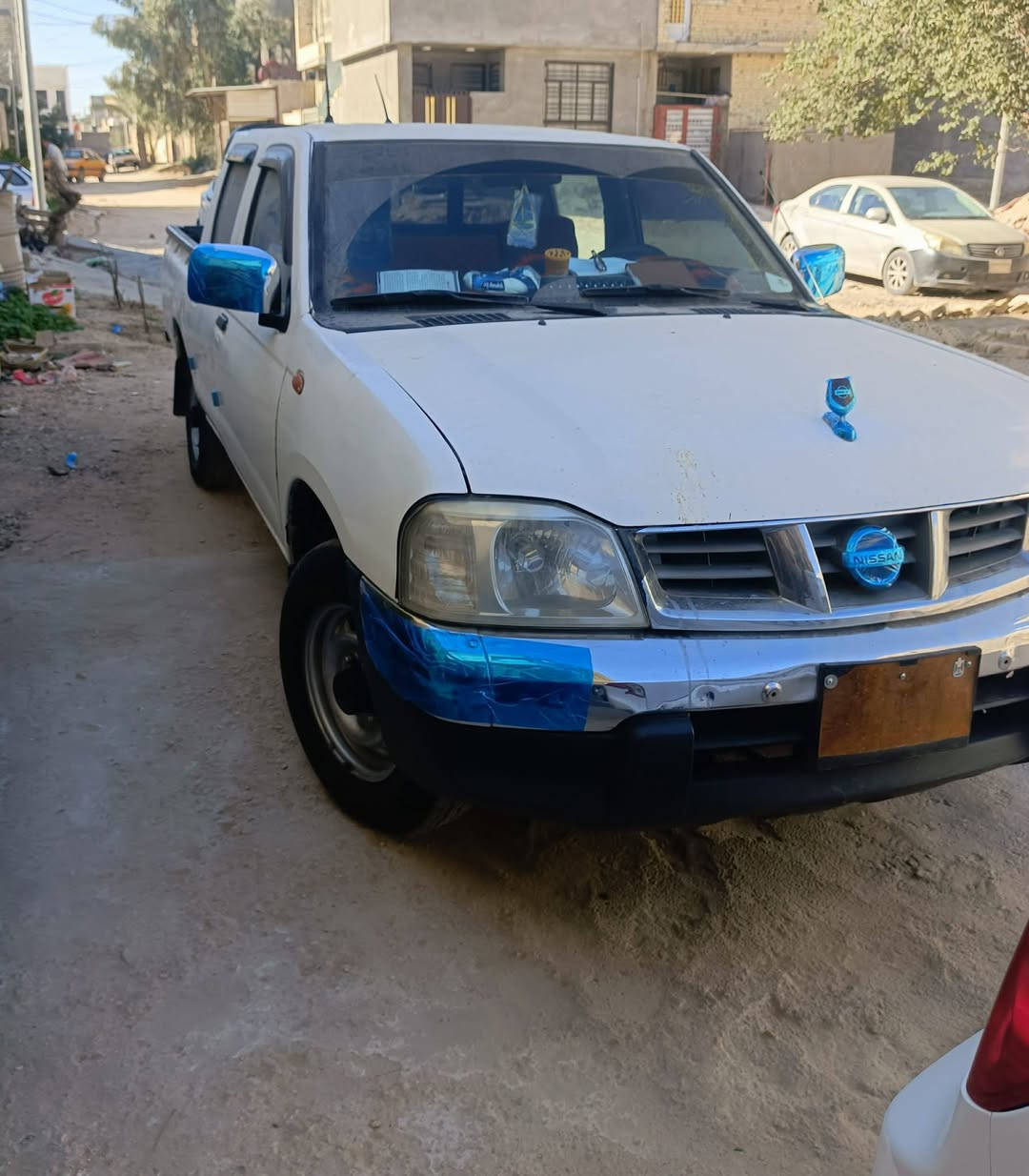 سياره نيسان مال مزاد مدفوع كمرك وجاهزه ال رقم رقم بابل تترقم   ***********
