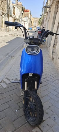 دراجه كهربائيه للبيع دراجه 4باتريات  باتري واحد ميشتغل  يرادلها باتري ...