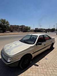 بيجو روى 2009 بأسمي السيارة رقم بغداد..... تبريد شغال محرك كفالة (الجر...