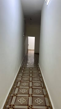 كركوك الواسطي • أرضي 100م • كراج مسقف