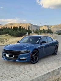 دوج جارجر sxt2021 رقم سليمانية  ماشية 65,000 mile قطعة ١ صبغ حادث بسيط...