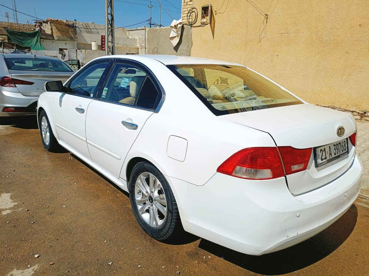 سلام عليكم سياره كيا وبتما موديل ٩كفال عام  بيه فقط جاملغ امامي مكان كوت حي الجهاد الرقم  ***********
