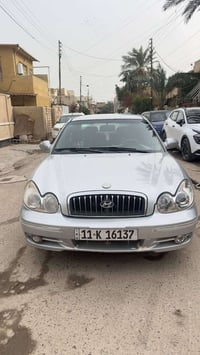 سوناتا وفود 2002 رقم بغداد انكليزي بأسمنا تحويل مباشر  محرك 6 سلندر 27...