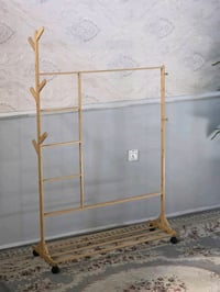 👕 منشر ملابس خشب بامبوا عملي، متين، وشكله أنيق ✨ مناسب للبيت، الشقة، أ...