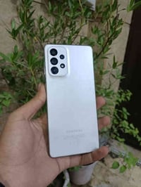 Galaxy A73 5Gذاكره 256/8 مكفول من كلشي عل فحص ما داخل تصليح ابدد شاشه ...