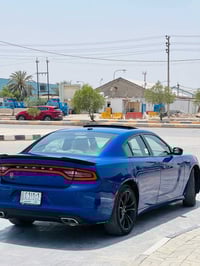 جارجر SXT خليجي موديل 18 مكفولة بيها مكانين بارد  رقم بغداد الجديد مشر...