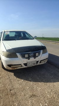 ليفان 2013 فول كير عادي  محرك كورله  رقم بغداد  مشروع وطني  تدفه تبريد...