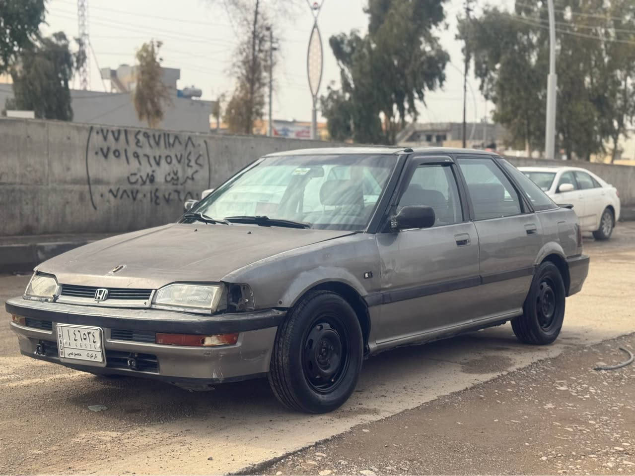 سلام عليكم هوندا ياباني موديل 1992سنويه جديد لحد 2027كير محرك مضبوط بيه اشويه صرف 4تيارات جديد سلايت كير اوتماتيك سعرها 21ورقه وبي مجال للطيبين مكانه التون كوبري *********** ديبيس, كركوك
