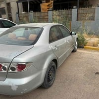 للبيع مازده  2004 رقم بغداد  السعر 32 ورقة  07716114001