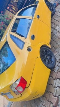 سياره ليفان للبيع محرك 4سلندر 1600بلادي كير عادي مصفره خط وبحث فقط سنو...