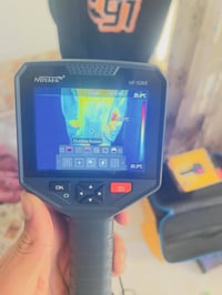 الكاميرا الحرارية المعروضة في الصورة هي طراز NOYAFA NF-526E.  يُستخدم ...