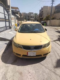 كيا فورتي موديل 2010 السيارة كير ومكينة سليم ما بيهن شي رقم بغداد وبأس...