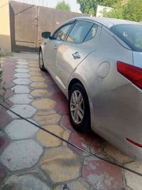 كيا اوبتما 2012 وارد ماشية 87300 ميل حقيقي مكينه 2400 المرغوبة لون رصا...