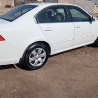 اوبتيما ٢٠٠٩ • باب سائق مبدل • رقم بغداد