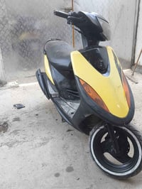 دراجه ماكس عدله بوشه 55 لون ليموني السعر 525 وبيه مجال 07759438145