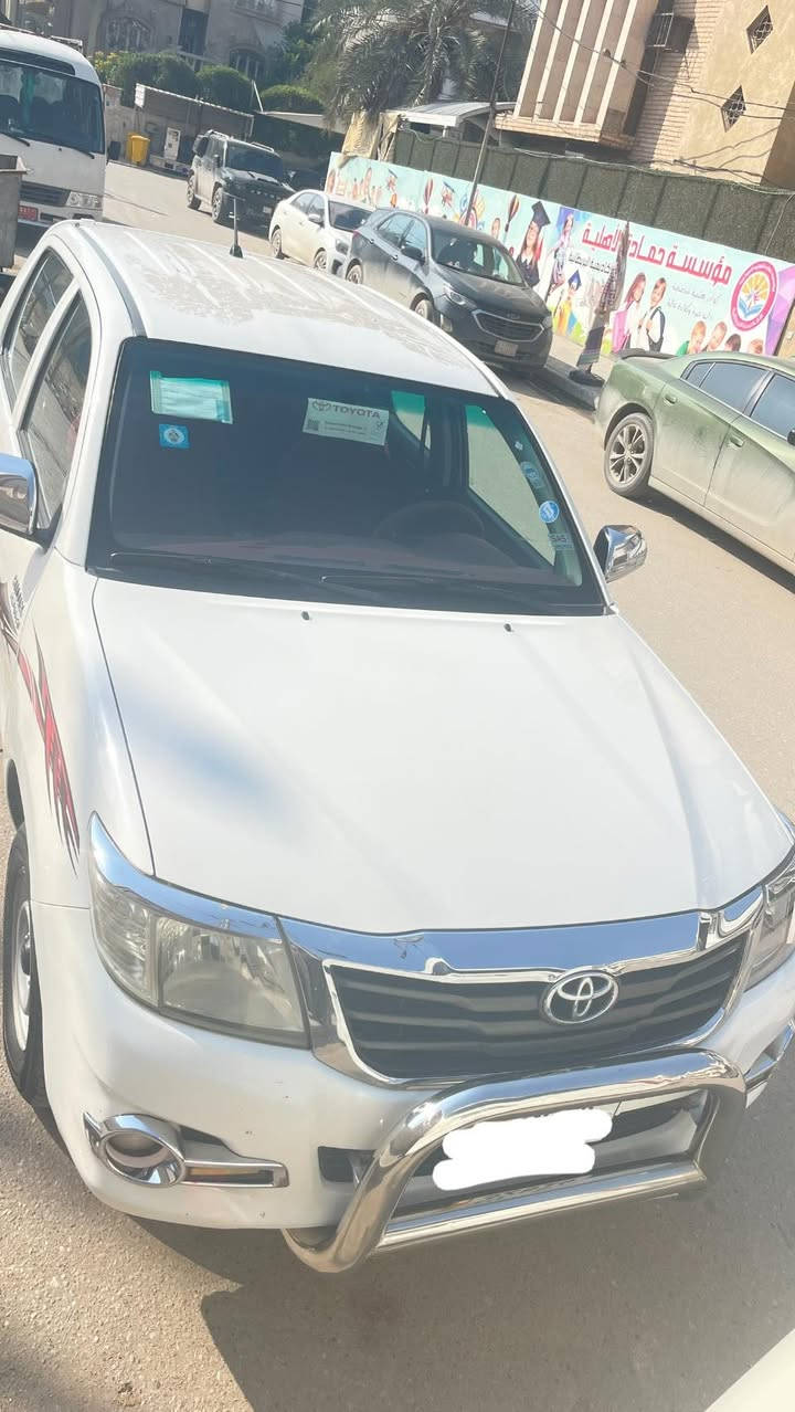 هايلوكس فلاونزة 2014  كير اوتامتيك كفالة عامة عدى بارد كد شبر سيارة جديدة ماشية 215 رقم انكليزي جديد المكان بصرة السعر 225 وبيها مجال.       الاتصال***********
