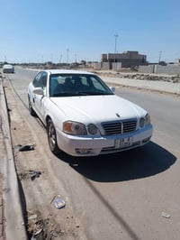 اوبتيما • كيا اوبتيما • اوبتيما 2006 • سيارة اوبتيما • سيارة كيا • وار...