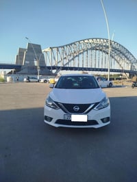 نيسان سنترا 18 SV وارد امريكي ضربتها باب وجاملغ  الباب مبدل نفس اللون ...