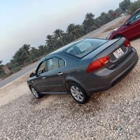 كيا اوبتما موديل 2009 خليجي مكينه 2000 رقم بابل دولي مكفوله من كلشي حد...