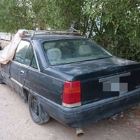 وبركاته  من رخصة الادمن للبيع سيارة اوبل اوميكا صالون 91 رقم بغداد مشر...