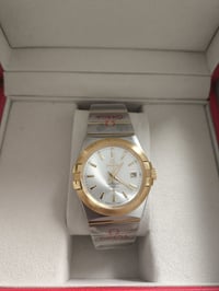 اوميغا كونستيليشن • ساعة • توصيل