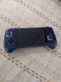 جهاز العاب anbernic  موديل rg556 نظيف جدا للبيع  يحتوي مشغلات العاب بل...