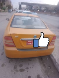 سيكي للبيع رقم بغداد احمر هيئة وغرامة صفر كابون بيها محرك كير شرط مابي...