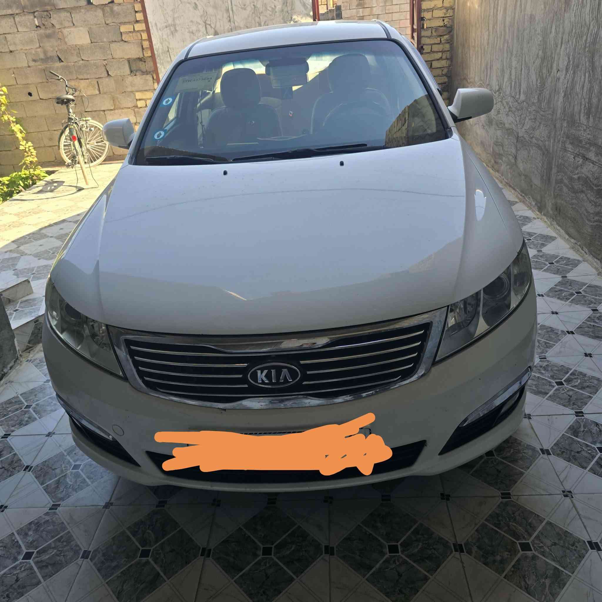 اوبتما 2009  رقم بغداد مكفوله من كلشي سنويه جديده بسامينه ***********
